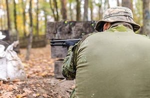 man holding rifle